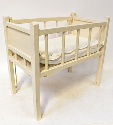 Lot 636 - A mid-20th century wicker pram with cream...