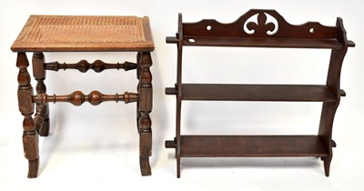 Lot 20 - A 1930s carved bergère seated footstool, on...