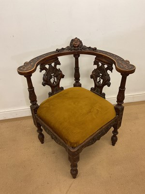 Lot 811 - A Victorian carved oak corner chair, 78 x 71 x...