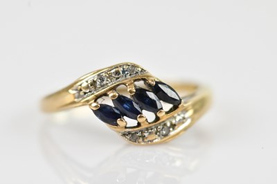 Lot 2524 - A 9ct yellow gold dress ring, set with a mêlée...