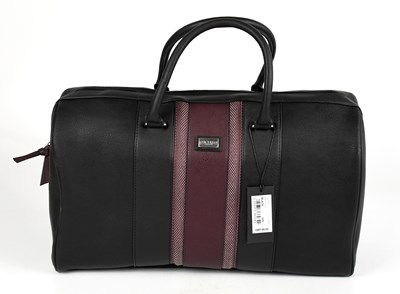 Lot 710 - TED BAKER; an unused black and burgundy faux...