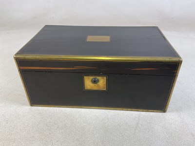 Lot 188 - A 19th century coromandel brass bound writing...