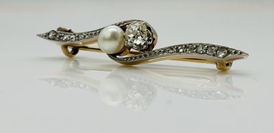 Lot 608 - An early 20th century yellow and white metal...