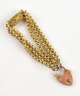 Lot 1212 - A yellow metal bracelet, formed as six chains...