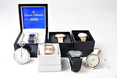 Lot 1414 - A mixed lot of boxed fashion watches, to...
