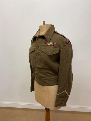 Lot 282 - A 1943 Royal Marine battle dress jacket, with...
