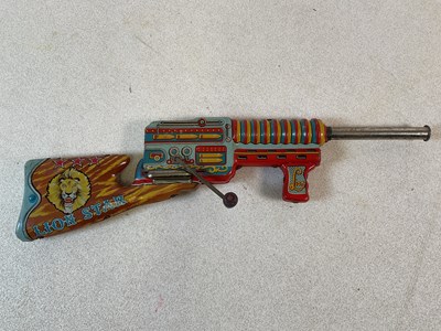 Lot 158 - A Lion Star Japanese tin plate barrel moving...