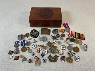 Lot 316 - An oak box with carved The Devonshire Regiment...