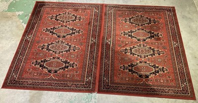 Lot 717 - A pair of machine woven Oriental style woollen...