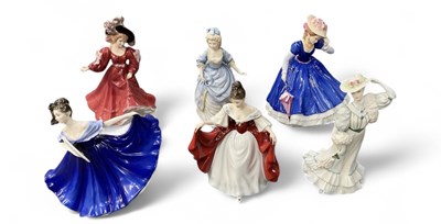 Lot 522 - ROYAL DOULTON; five porcelain figures of...