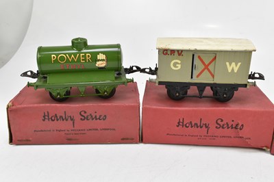 Lot 258 - HORNBY; four O gauge wagons and vans