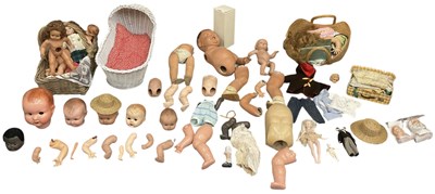 Lot 483 - A large quantity of assorted doll parts...