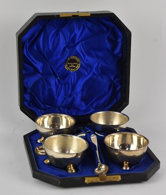 Lot 1266 - A cased set of four white metal open...