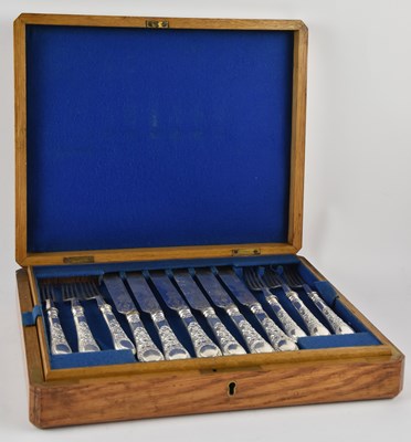 Lot 1181 - A cased set of twelve white metal handled...