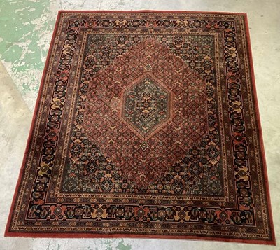 Lot 719 - A machine woven Middle Eastern rug, 202 x 258cm.