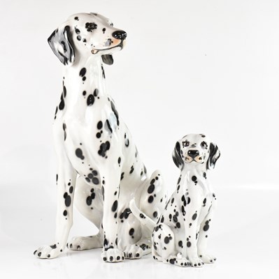 Lot 1908 - Two ceramic Dalmatian figures, stamped to the...