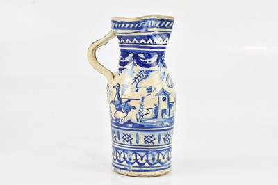 Lot 1909 - A 19th century Italian faience ware jug,...