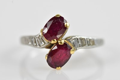 Lot 2240 - A platinum diamond and ruby crossover dress...