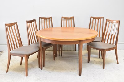 Lot 6 - G PLAN; a circular extending dining tabke,...