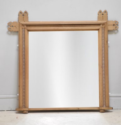 Lot 34 - A Victorian Gothic Revival pine overmantel...
