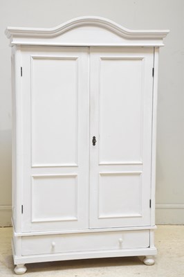 Lot 137 - A modern white painted armoire with moulded...