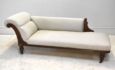 Lot 224 - A Victorian walnut framed chaise lounge,...