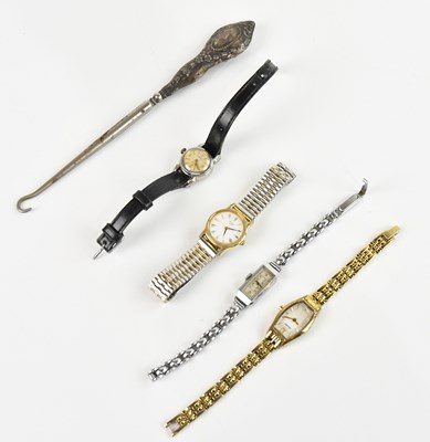 Lot 542 - A collection of four watches comprising an...