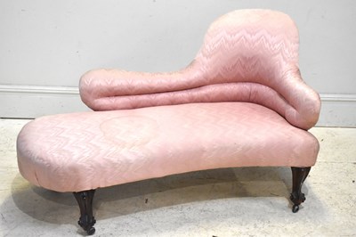 Lot 223 - A Victorian chaise lounge, upholstered in a...