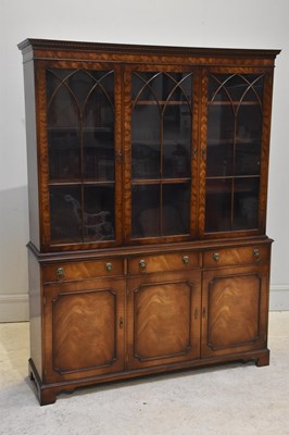 Lot 136 - A large reproduction mahogany bookcase, with...
