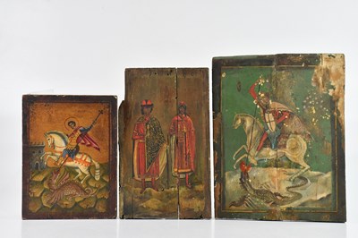 Lot 1046 - Three hand painted icons, two of St George and...