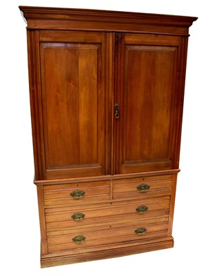 Lot 10 - An Edwardian mahogany linen press, the stepped...