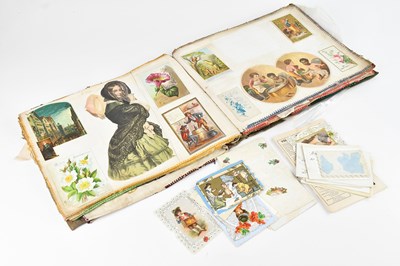 Lot 631 - An early 20th century Oriental cloth scrapbook...