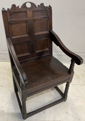 Lot 184 - An 18th century carved and panelled oak...