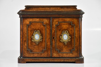Lot 1026 - A Victorian walnut table cabinet, with...