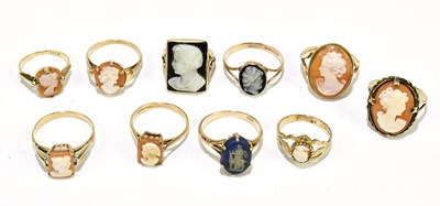 Lot 1151 - A collection of eight 9ct gold cameo set rings,...