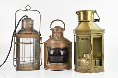 Lot 1017 - A vintage copper port side lamp, with red...
