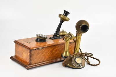 Lot 1047 - An early 20th century oak mounted wall...