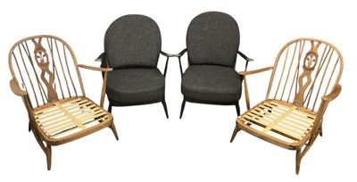 Lot 45 - ERCOL; a pair of mid century black painted...