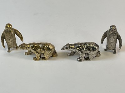 Lot 563 - A group of four Elizabeth II hallmarked silver...