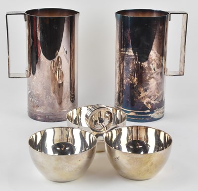 Lot 1230 - RALPH LAUREN; a pair of white metal water jugs,...