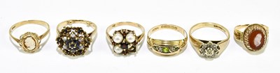 Lot 1176 - Four 9ct gold gem set rings, gross weight 8.5g,...