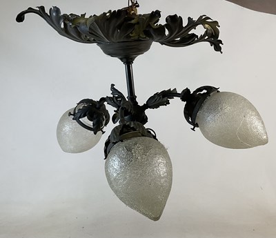 Lot 704 - An early 20th century acanthus scrolling light...