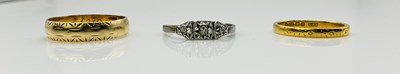Lot 612 - A 22ct yellow gold wedding band, size N,...
