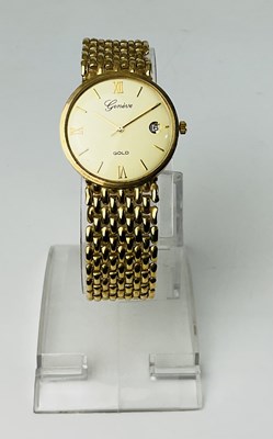 Lot 689 - A 9ct yellow gold wristwatch, with circular...