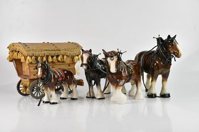Lot 1930 - Four decorative ceramic shire horses, one...