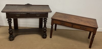 Lot 843 - An oak hall table with two short drawers and...