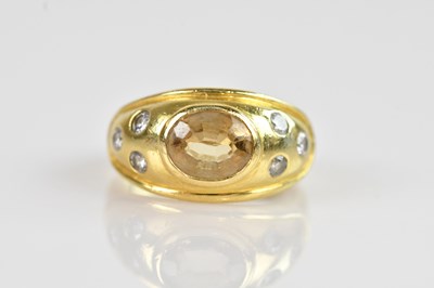 Lot 2297 - A yellow metal diamond and citrine broad ring...