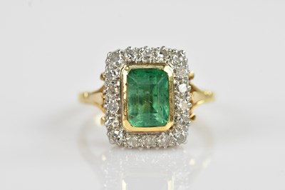 Lot 2291 - A yellow and white metal diamond and emerald...