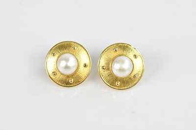 Lot 1363 - A pair of yellow metal pearl set target ear...
