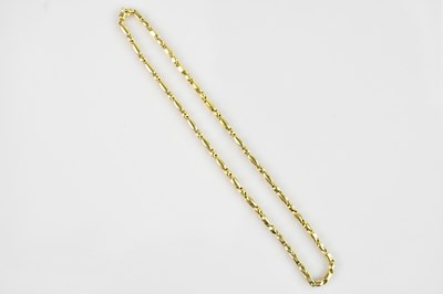 Lot 2018 - A yellow metal figaro link necklace, stamped...